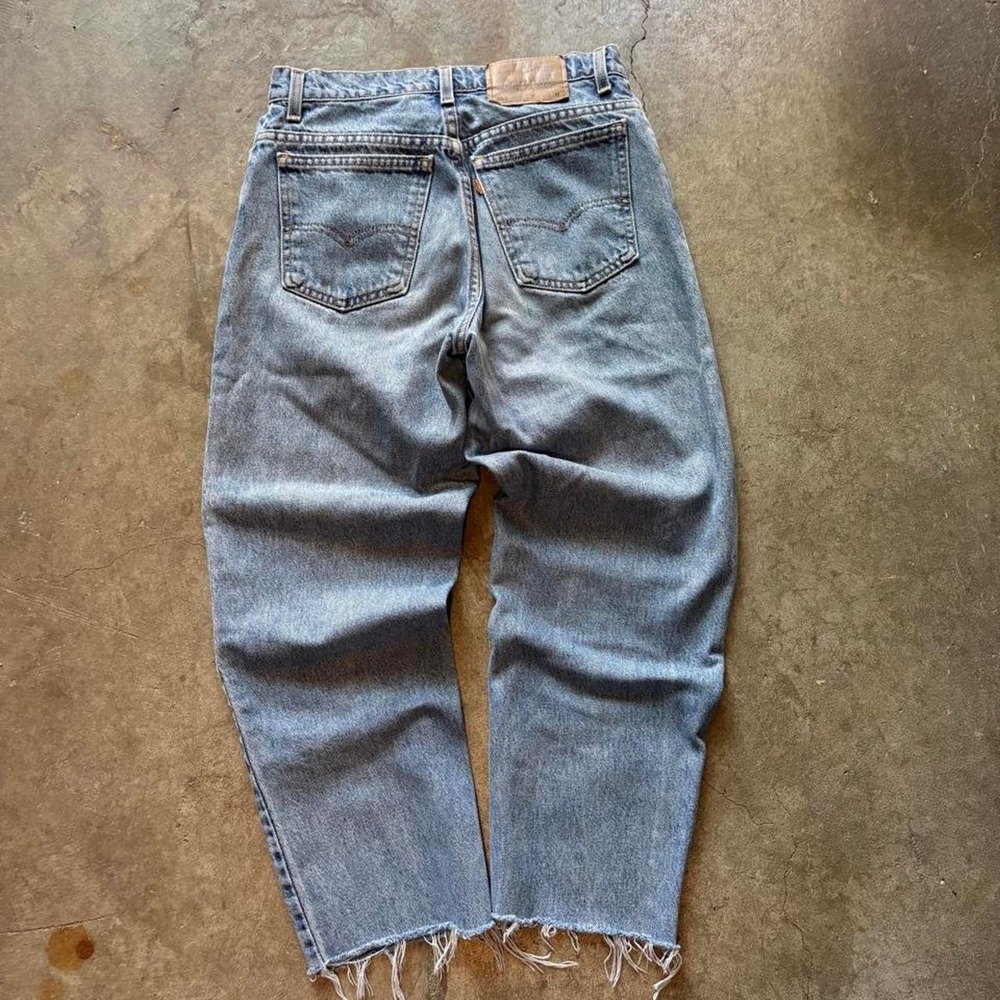 Vintage 90s made in USA Levi's 950 blue jeans with orange tab  Size 27"